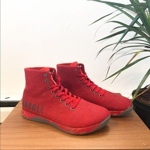 Red high top trainers